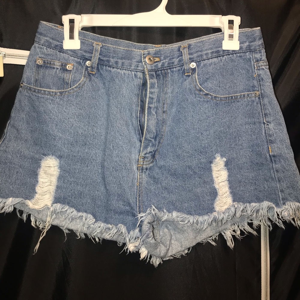 Denim’s distressed high waisted shorts
